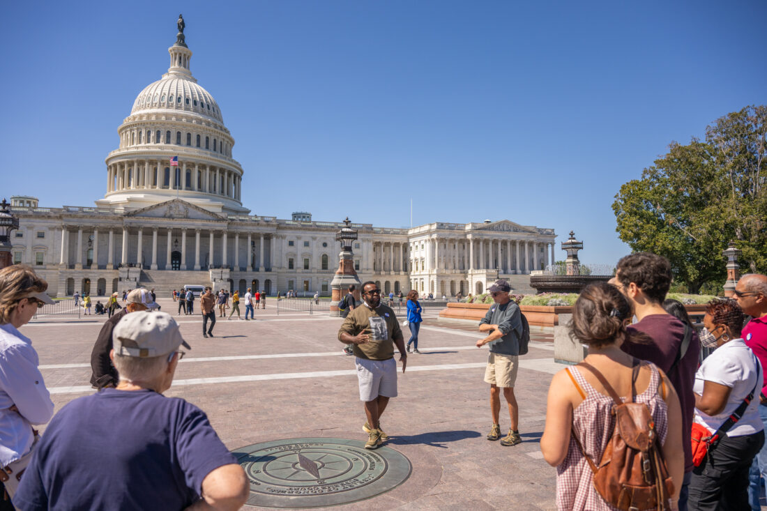 A group stands at the capitol