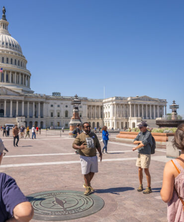 A group stands at the capitol