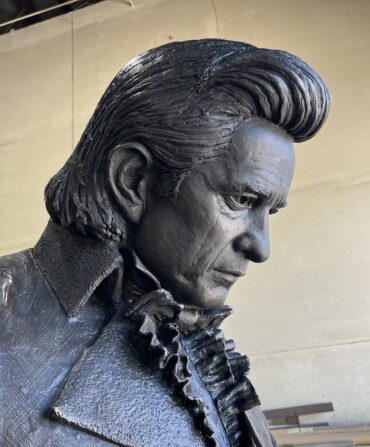 A close up a Johnny Cash sculpture