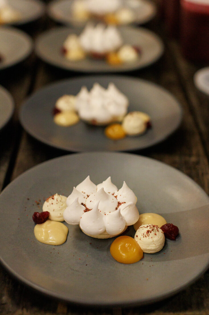 A sweet ending of Eton Mess with pink peppercorn meringue, honey curd, cranberry compote, and Florida citrus chantilly by chef McKibbin. 