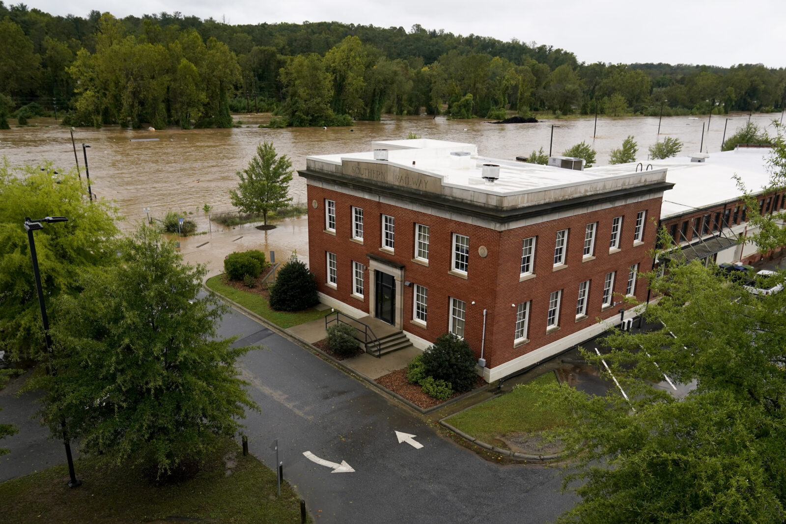 The banks of the Swannanoa river overflow in Asheville
