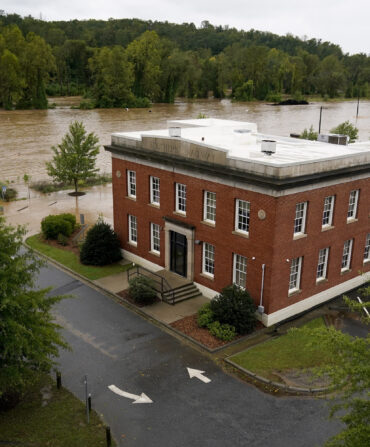 The banks of the Swannanoa river overflow in Asheville