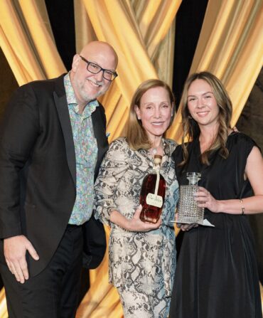 Marci Palatella and others with the award.