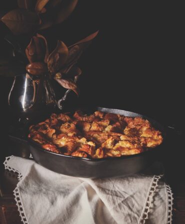 A baking pan with croissant bread pudding