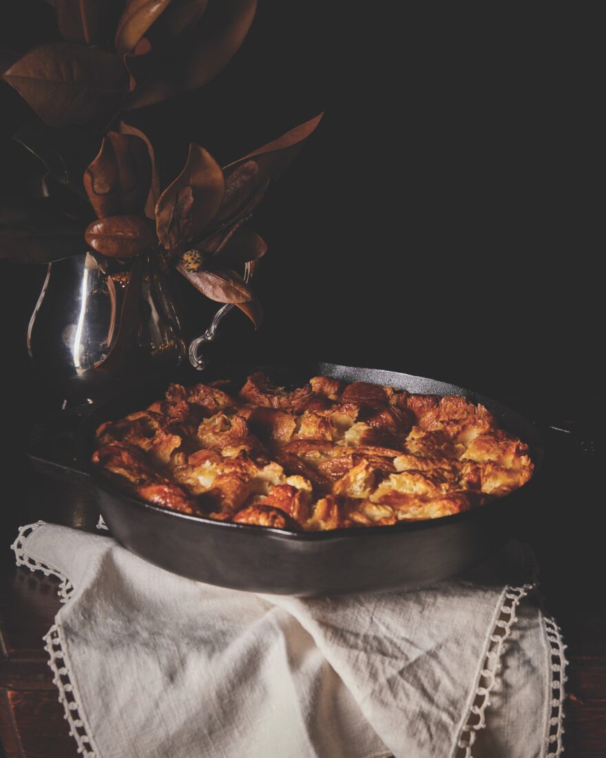 A baking pan with croissant bread pudding