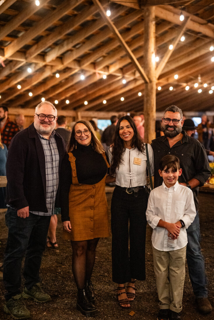 From left: Christian Bryant, G&G senior vice president and publisher, Explore Asheville’s Dodie Stephens, vice president of marketing, Luisa Yen, director of public relations, and 2023 Champion JJ Apodaca with his son.