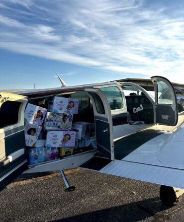 A plane filled with boxes of supplies