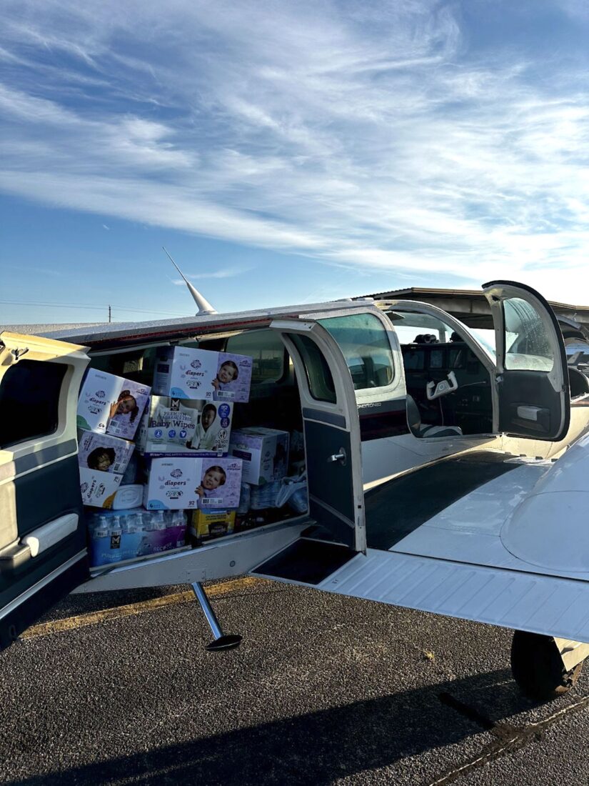 A plane filled with boxes of supplies