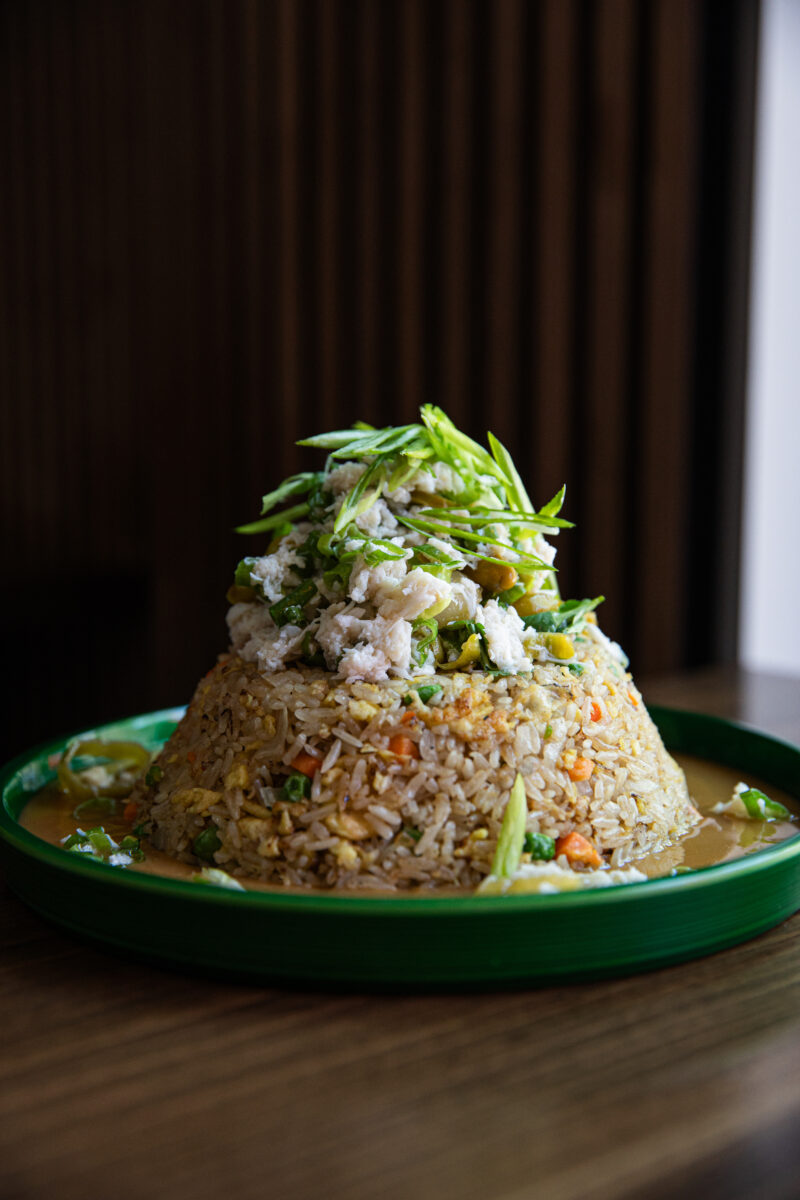 A pile of crab fried rice with gravy at Beautiful South