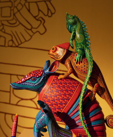 Colorful sculptures of an armadillo, chameleon, and iguana,