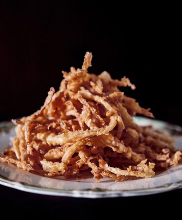 A plate of fried onion rings