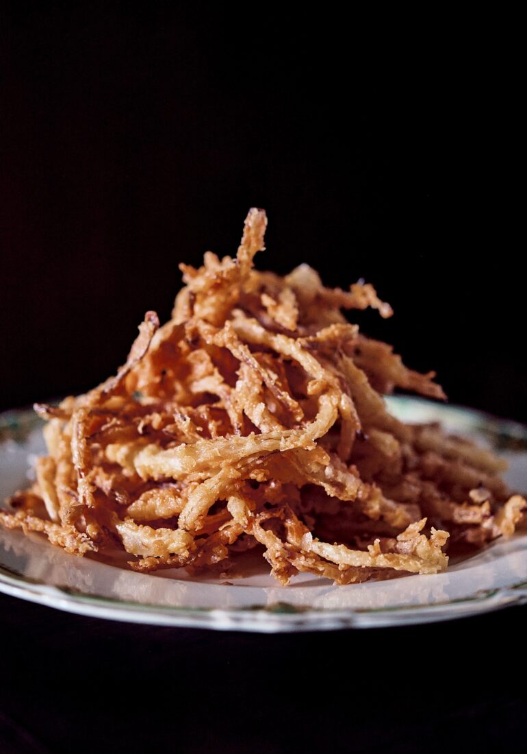 A plate of fried onion rings