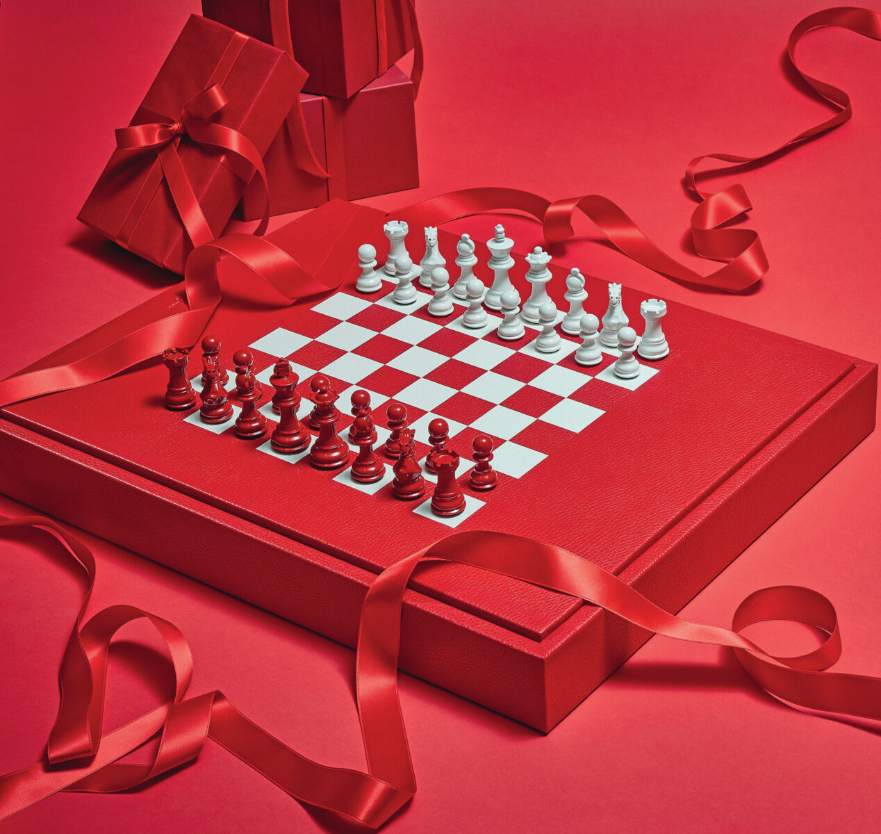 A chess board on a red background