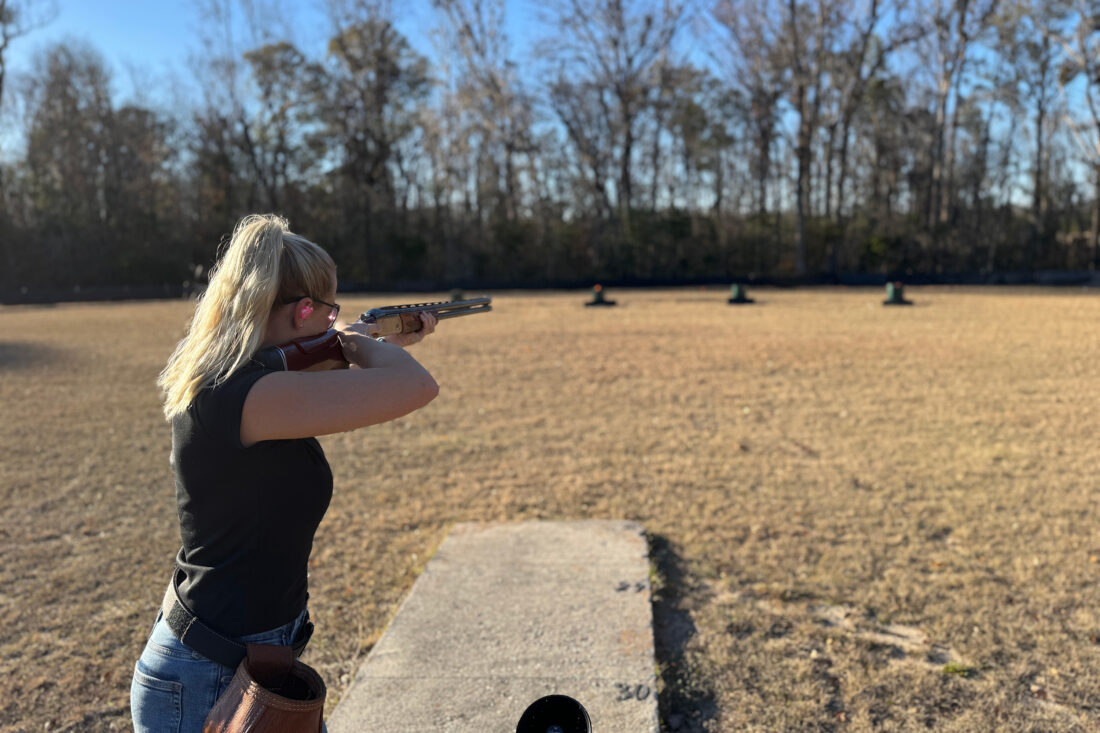 A woman shooting helice