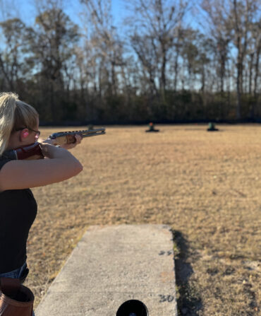 A woman shooting helice