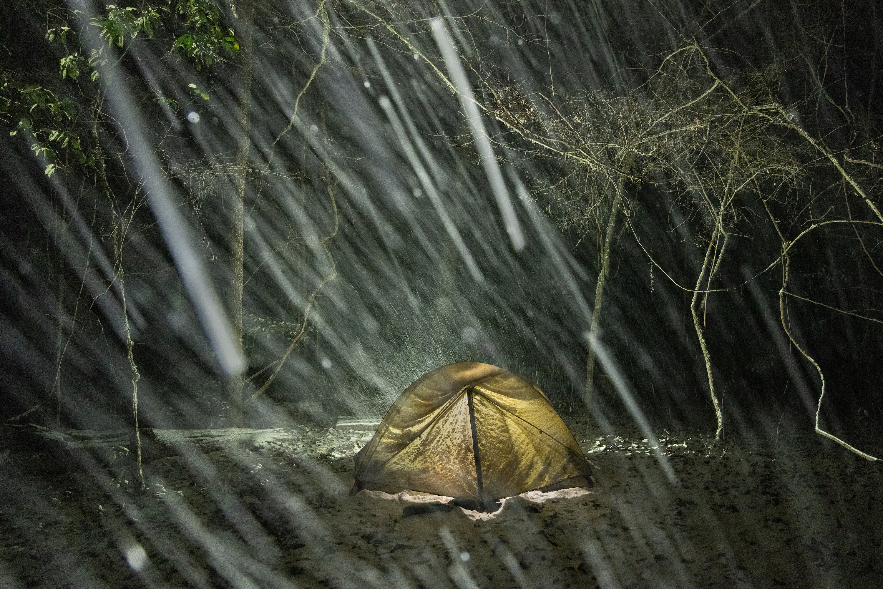 A yellow tent in the snow