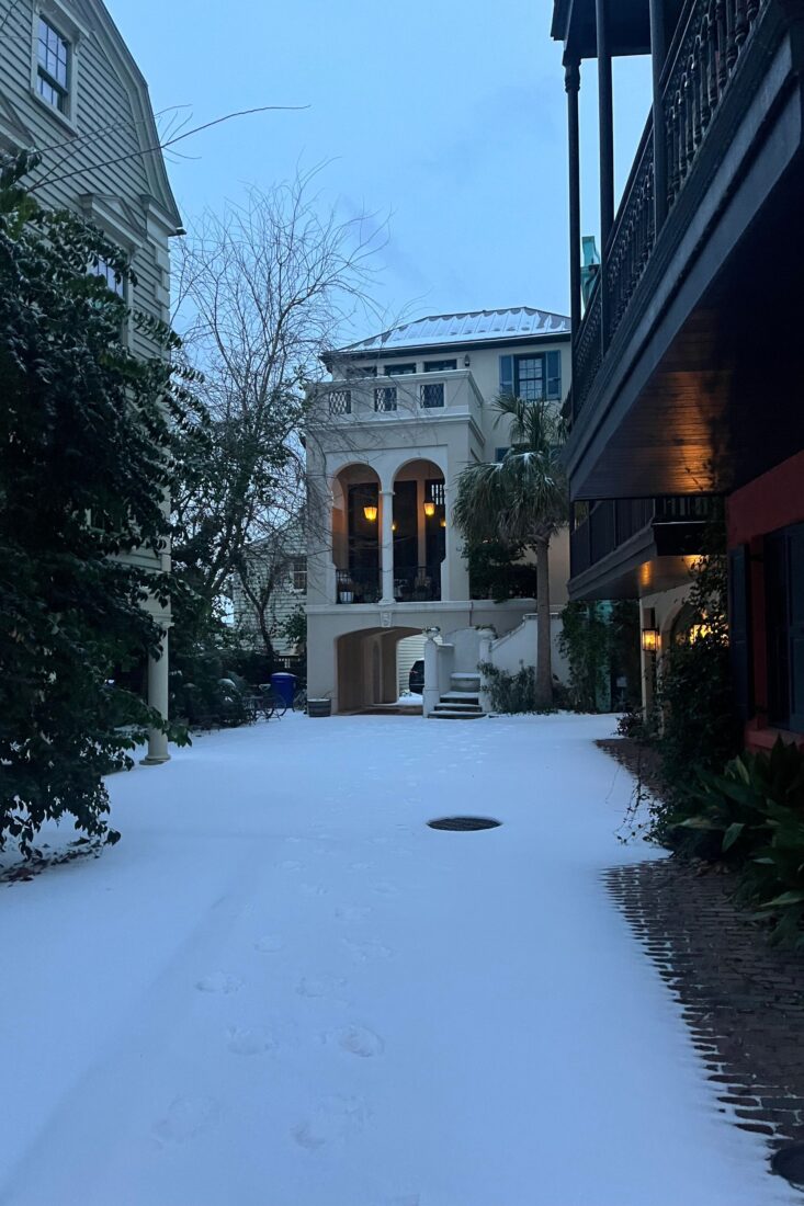 Homes on a narrow, snowy street