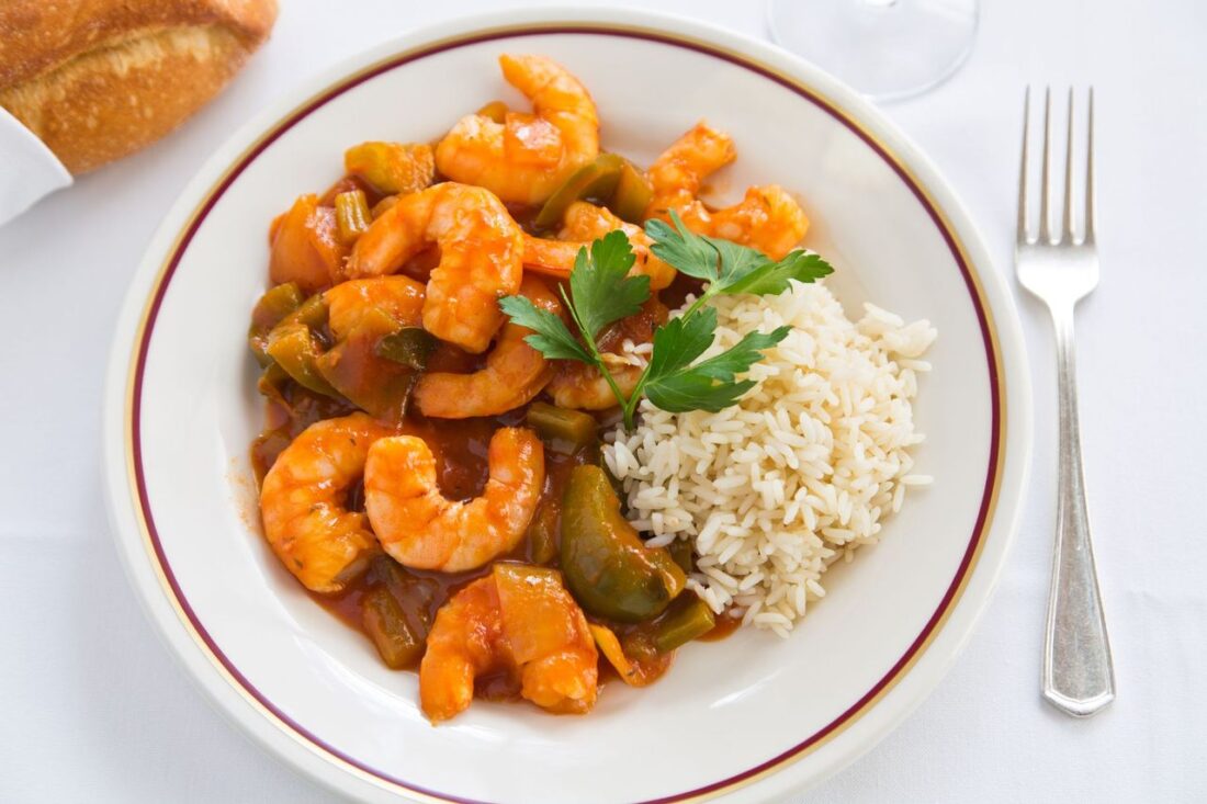 A bowl of shrimp creole on rice