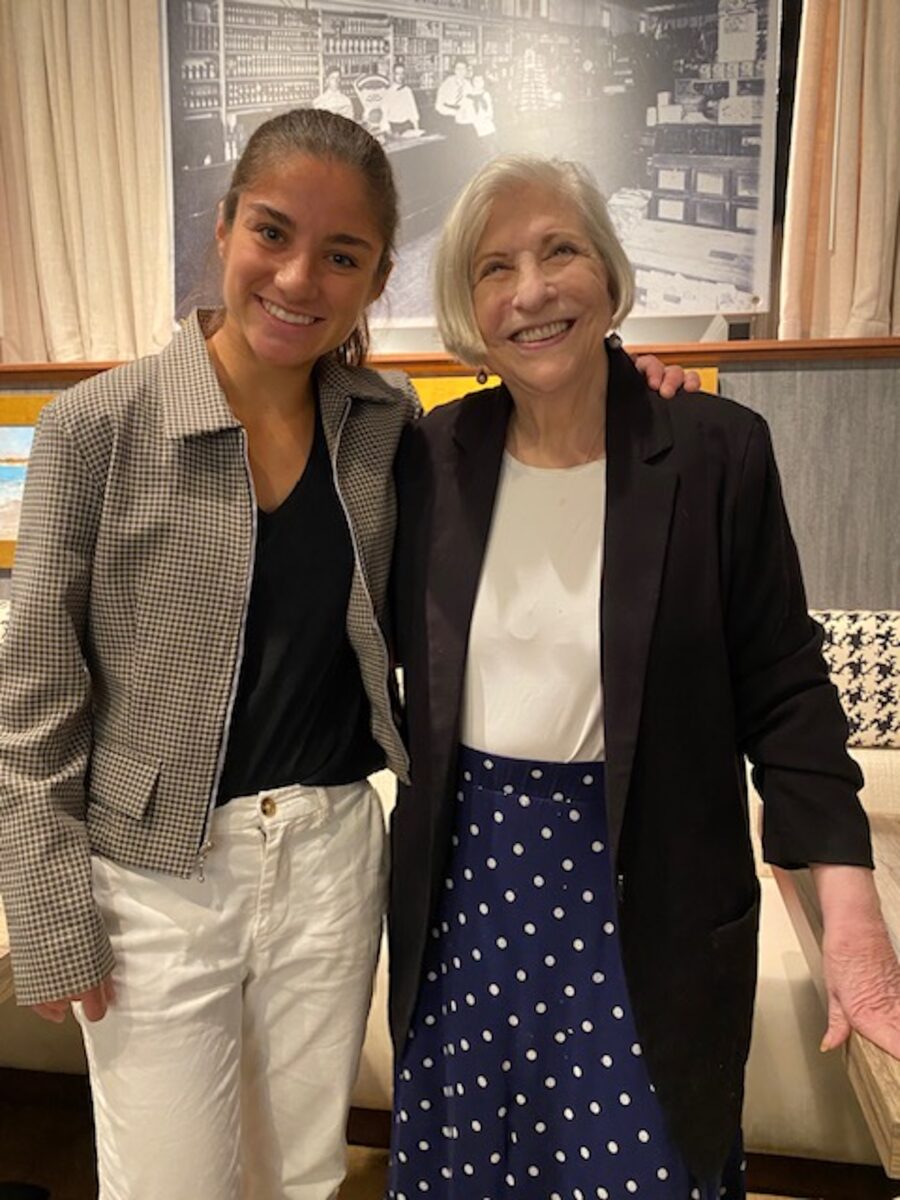 A woman stands next to Nathalie Dupree