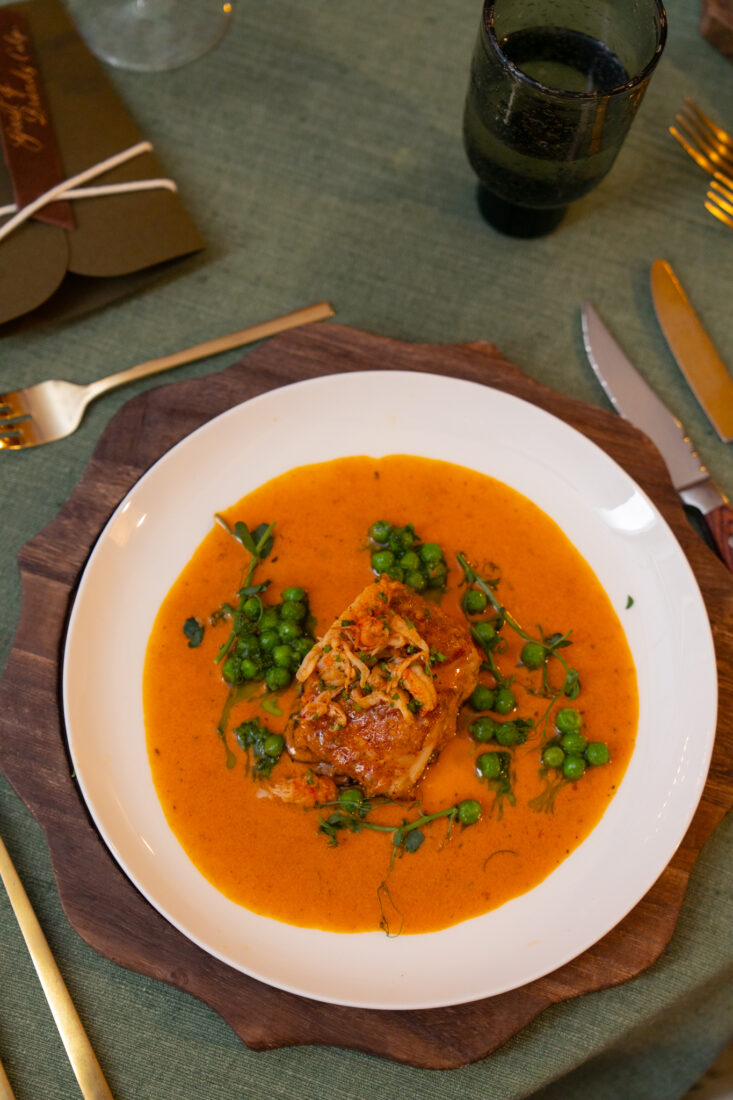 Chef David Bancroft’s sea course: redfish on the halfshell with crawfish and “deckhand butter.”