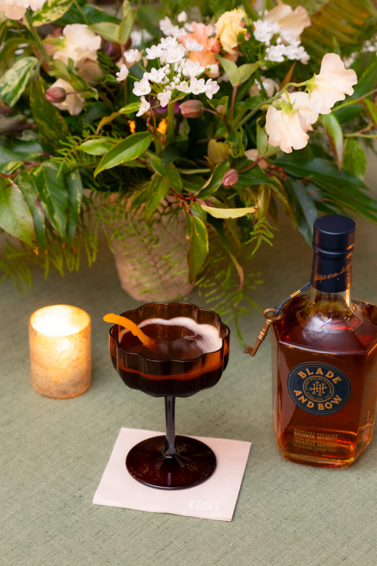 The Paper Plane cocktail composed of Blade and Bow Kentucky Straight Bourbon Whiskey, an Italian aperitif, amaro, and lemon juice.