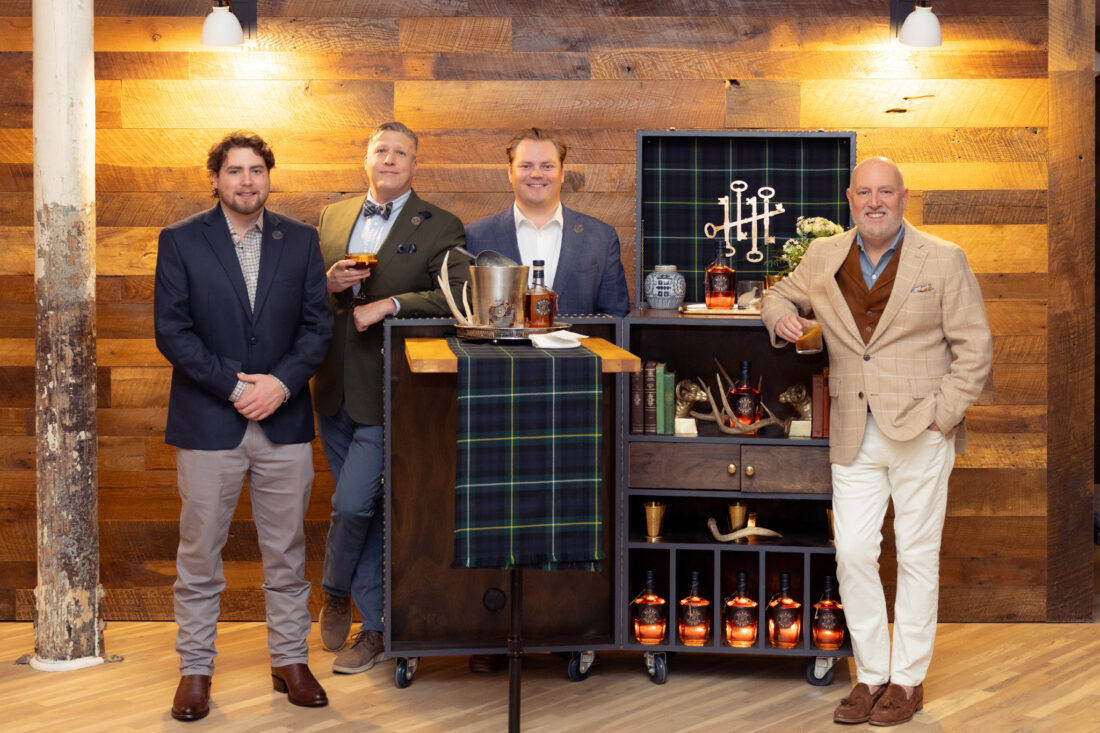 Blade and Bow brand ambassadors Courtland Parrott, Peter Sununu, Jack Souder, and Jeff Parrott with the brand’s iconic trunk bar.