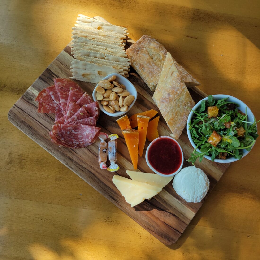 A cheese board with snacks