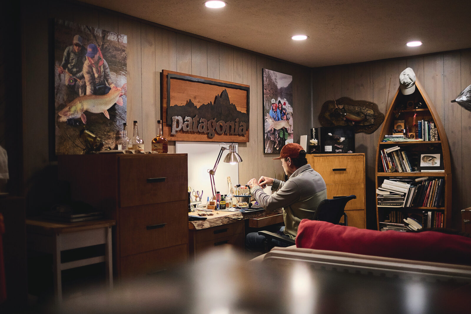 A man sits at a table in an office