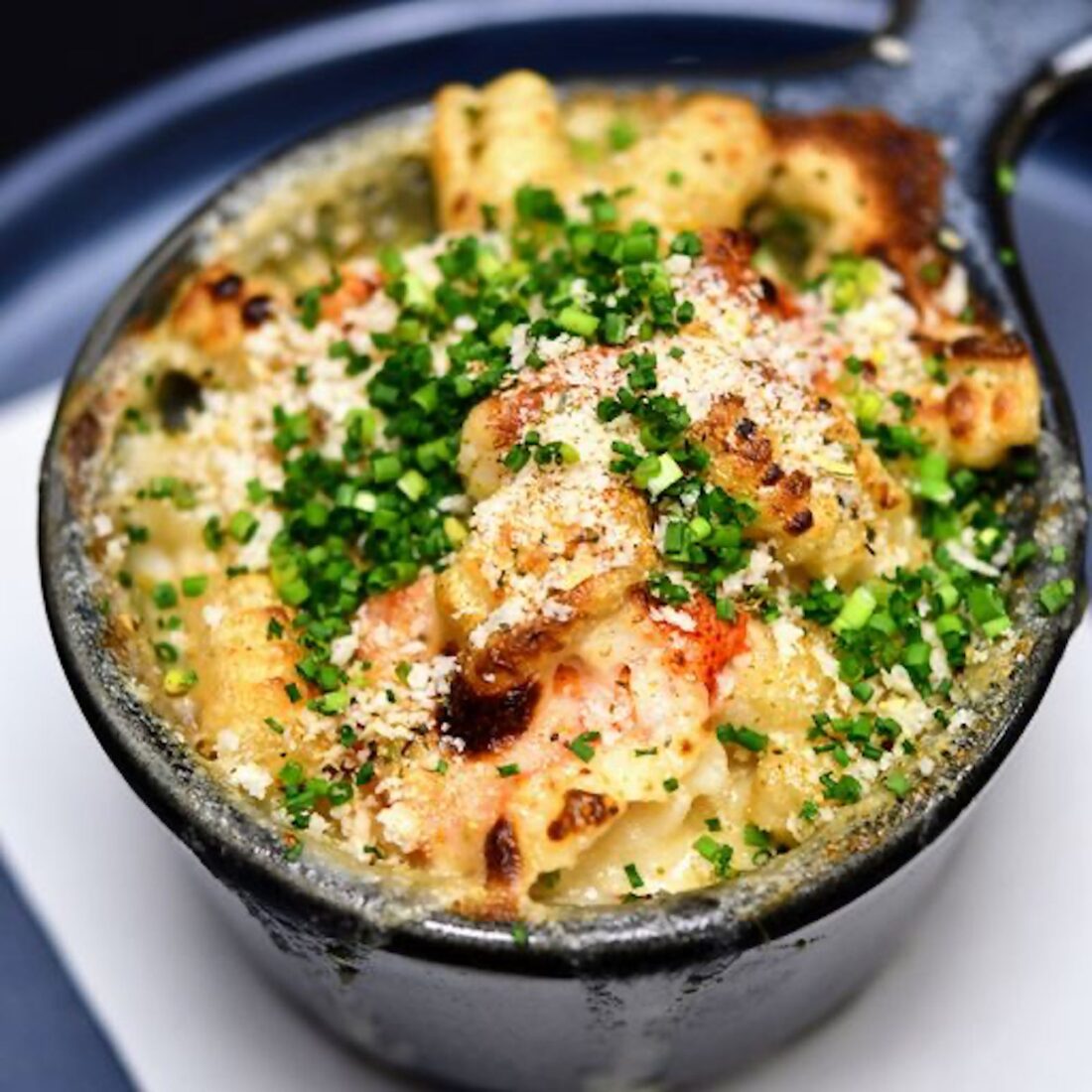 A dish of crabmeat mac and cheese