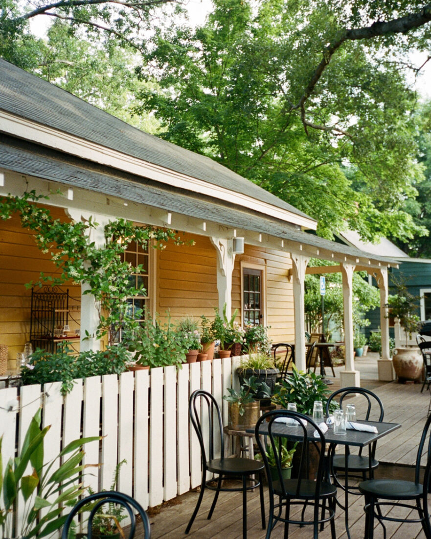 A lush porch outside a restaurant