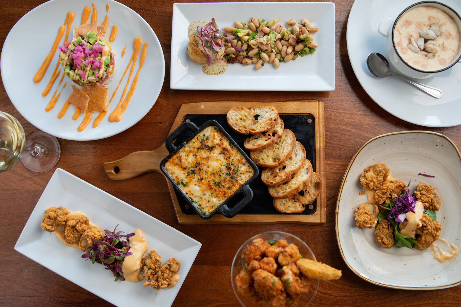 A spread of seafood plates on a table