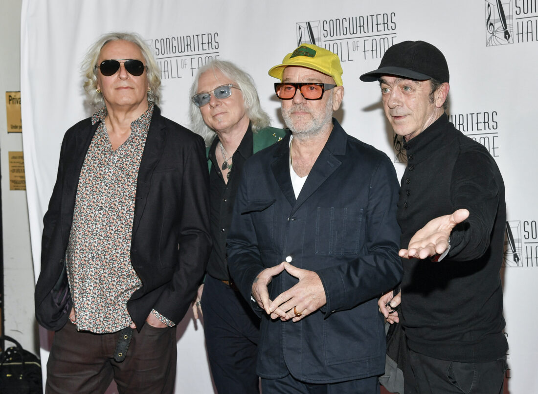 A portrait of a group of four men