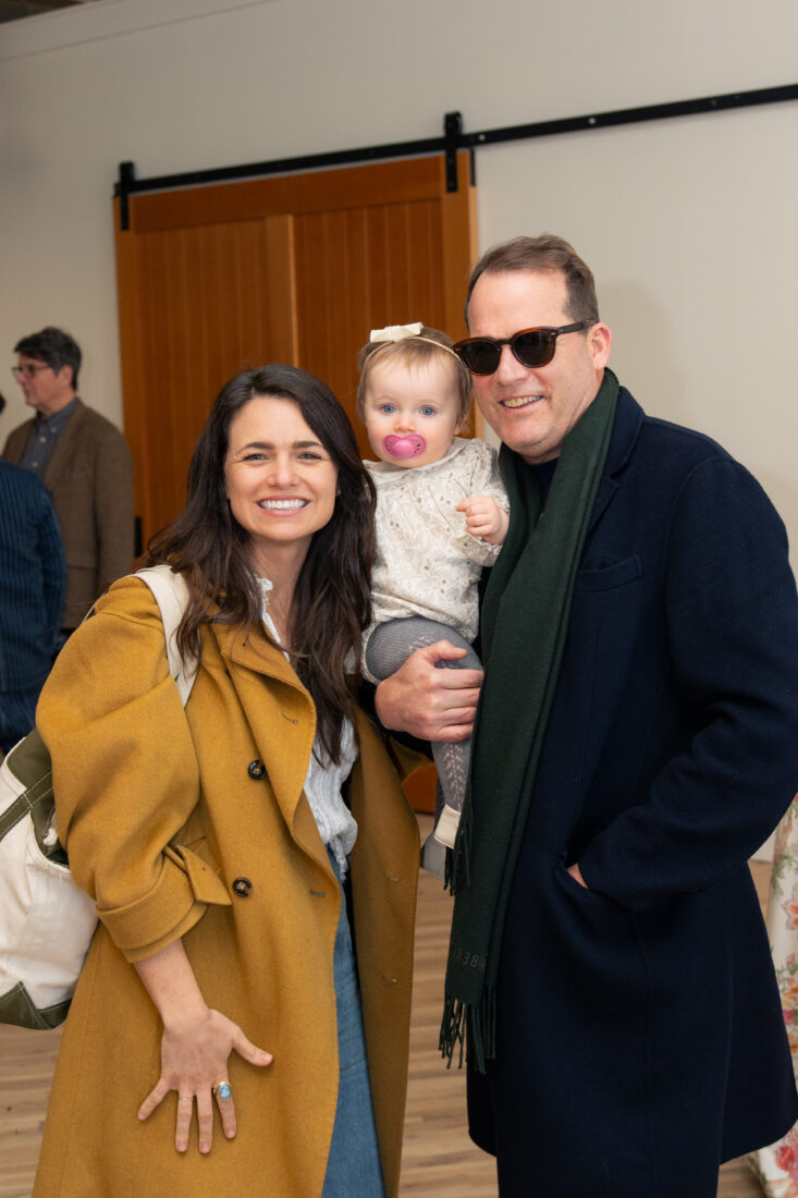 Jaimie and John Dewberry with their daughter.