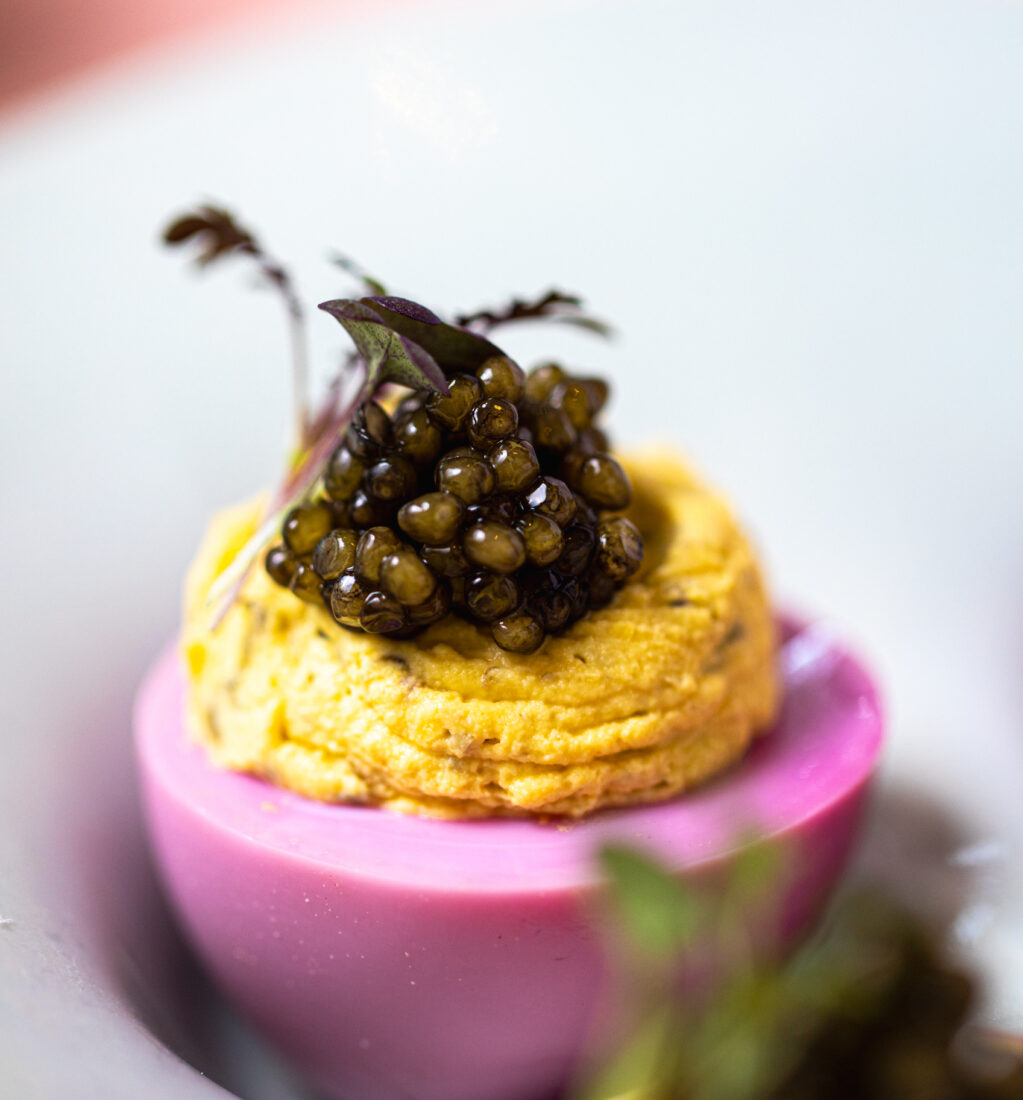 A detail of caviar on a deviled egg