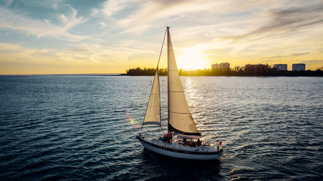 A sailboat at sunset