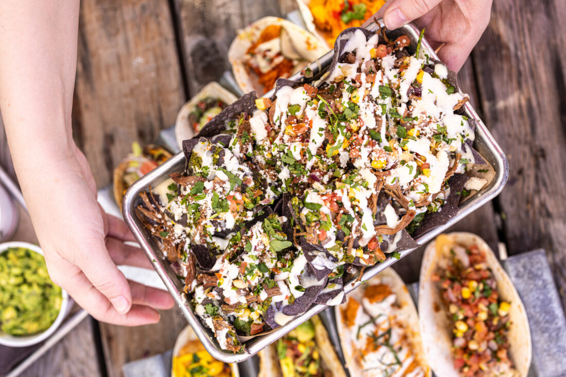 A busy nachos tray