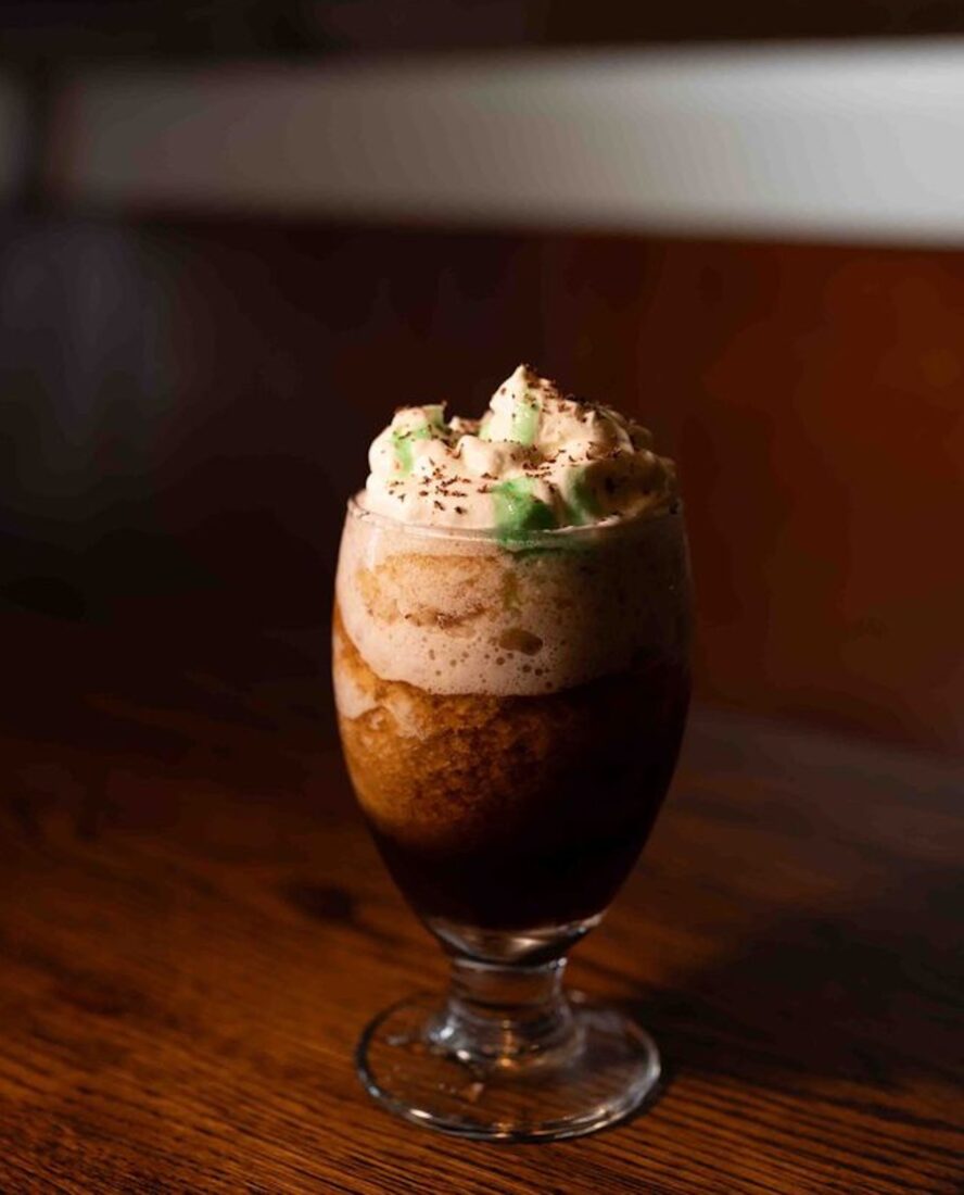 A glass cup of irish coffee