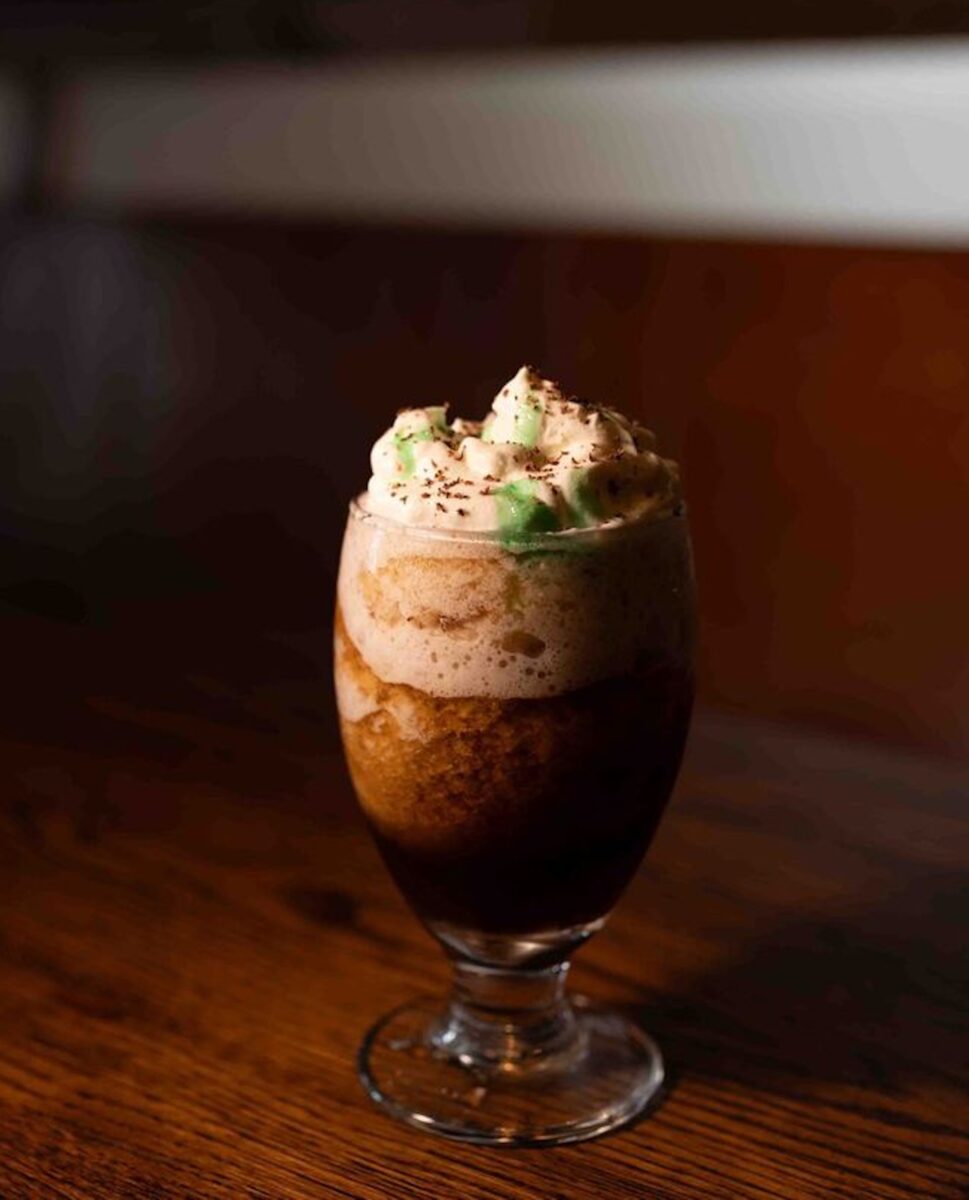 A glass cup of irish coffee