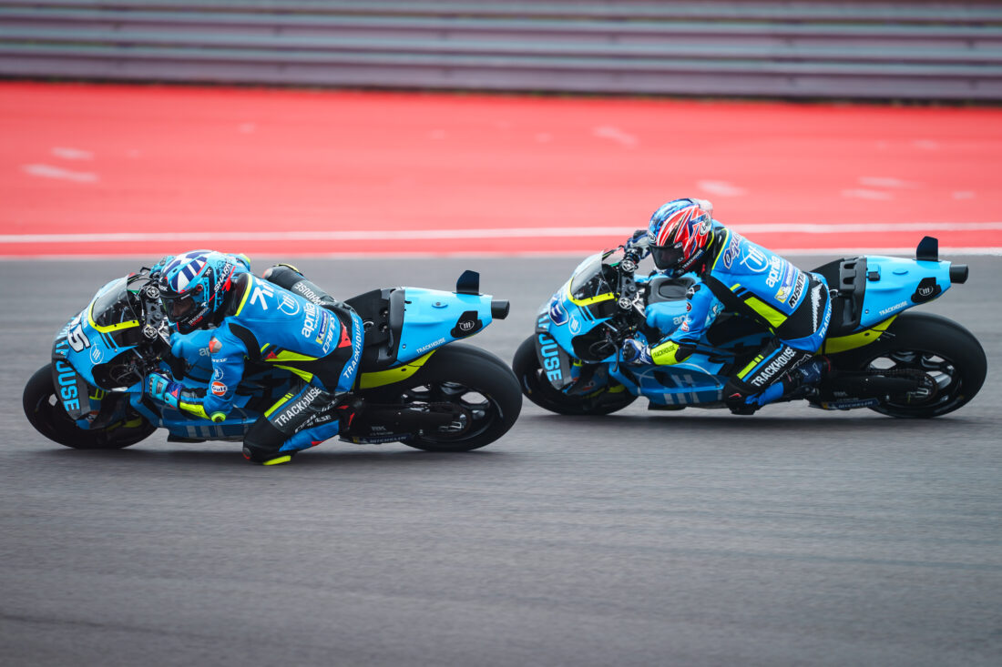 Two MotoGP riders on blue bikes