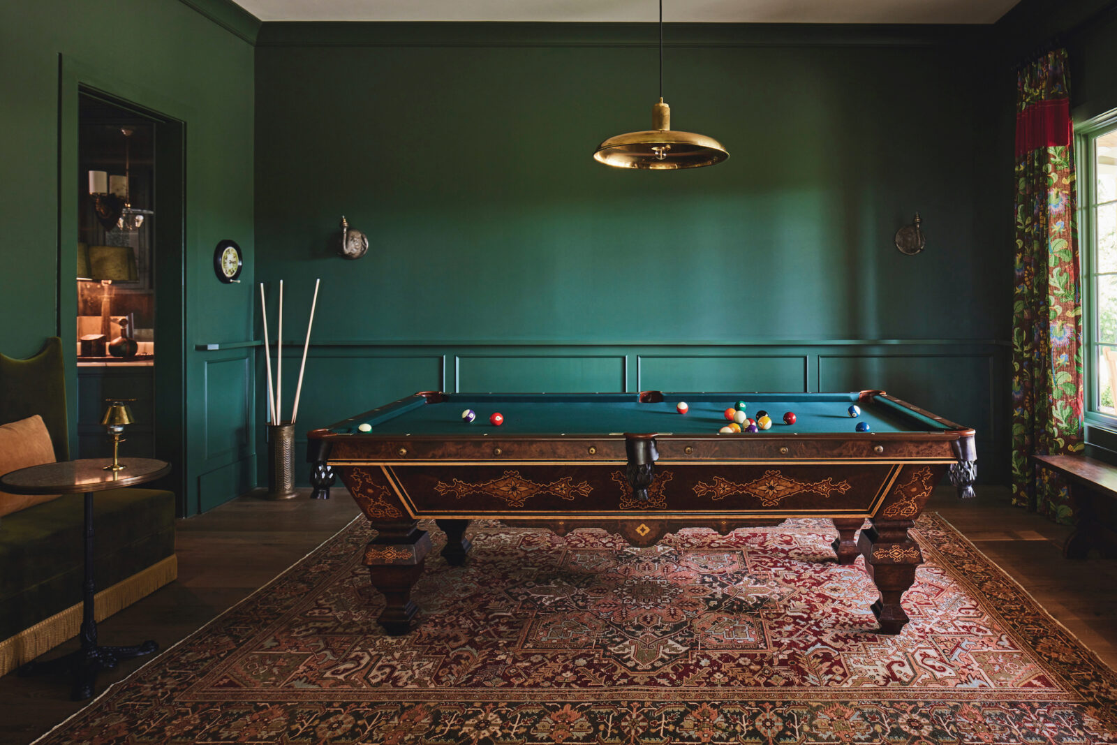 A teal billiards room