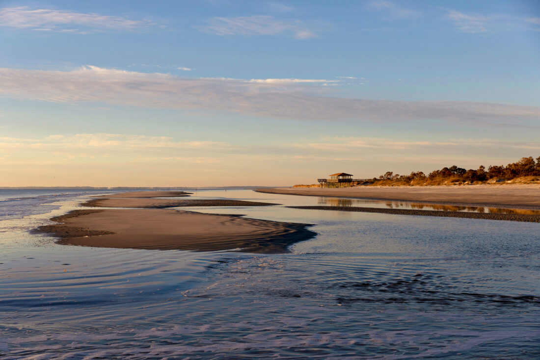 A beach with a sunset