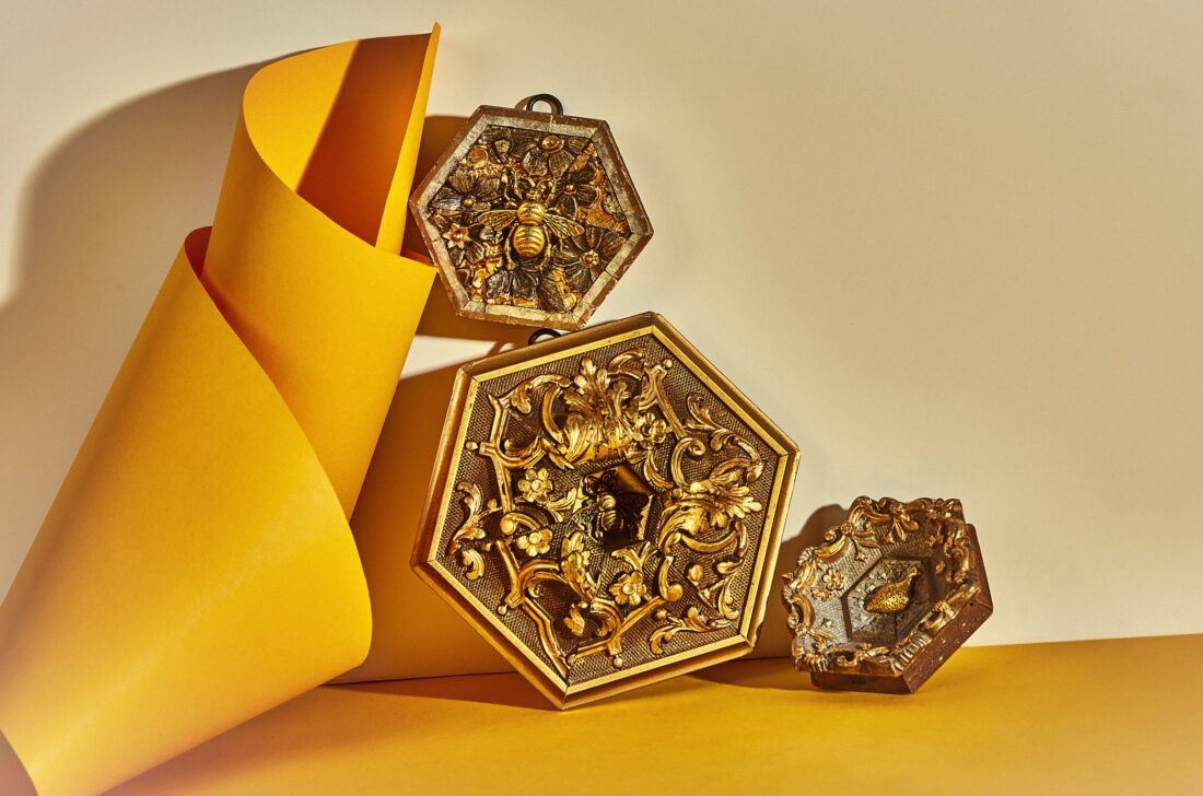 Golden octagonal bee sculptures