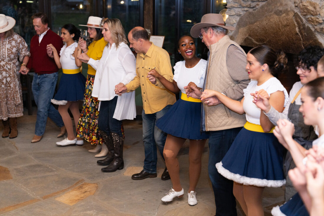 Paul Attaway, Cynthia Morgan,  Heather Harris, David Greenen, and Irv Kron learn basic techniques from the Bailey Mountain Cloggers, a National Championship-winning group from Mars Hill University in North Carolina.