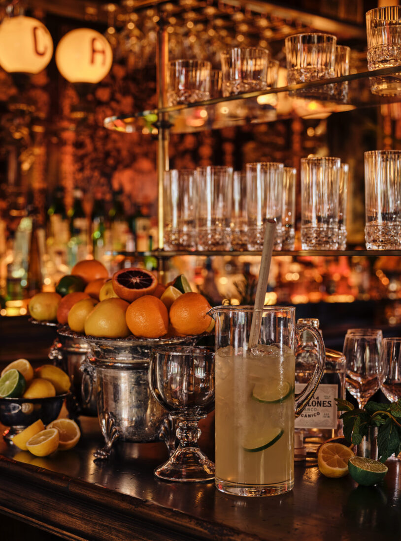 A pitcher of margs on a bar