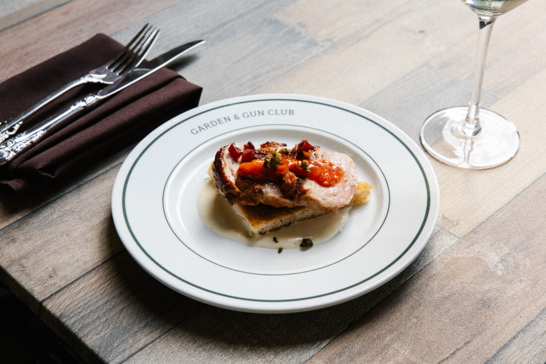 The Hot Brown: smoked duck breast, tomato bacon jam, Mornay sauce, and toast points.