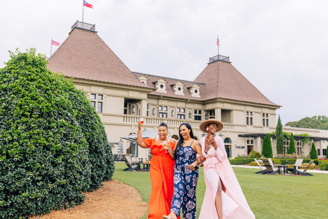 Women stands outside a resort