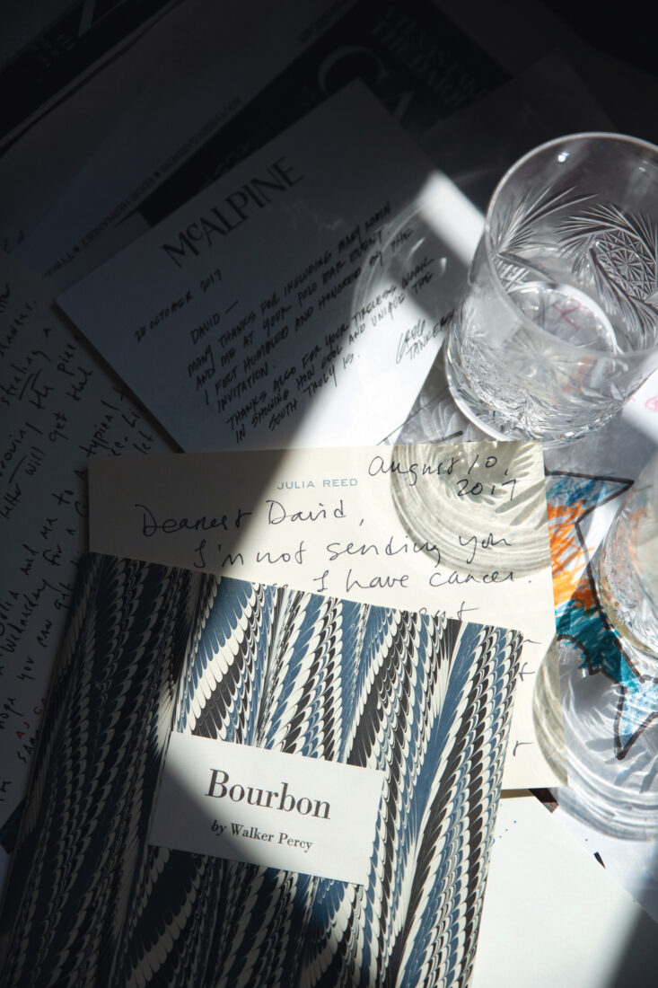 A book and letter on a desk