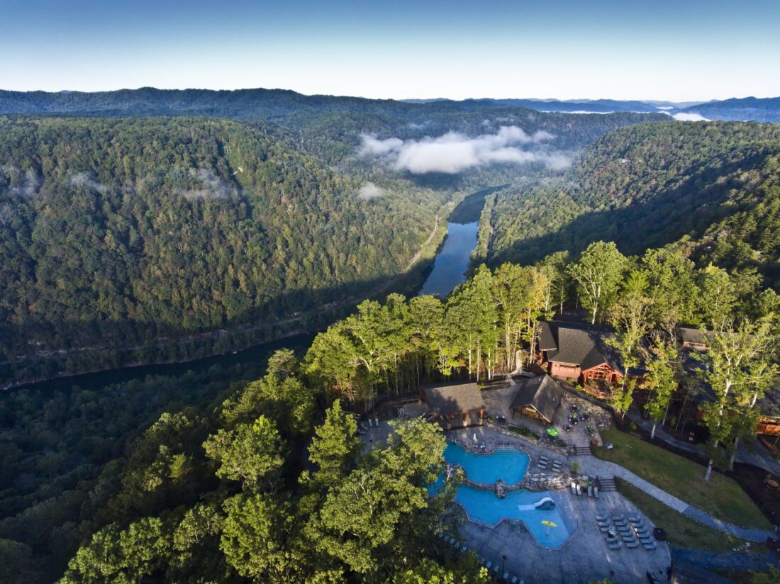 A lodge looks out over a mountain landscape
