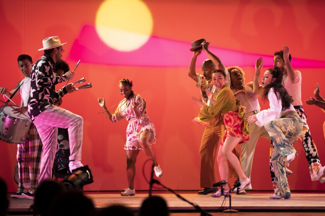 People dance on a stage