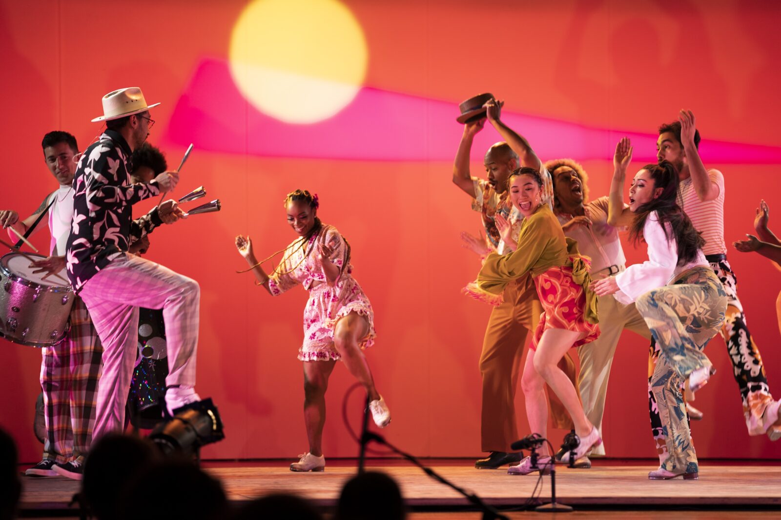 People dance on a stage